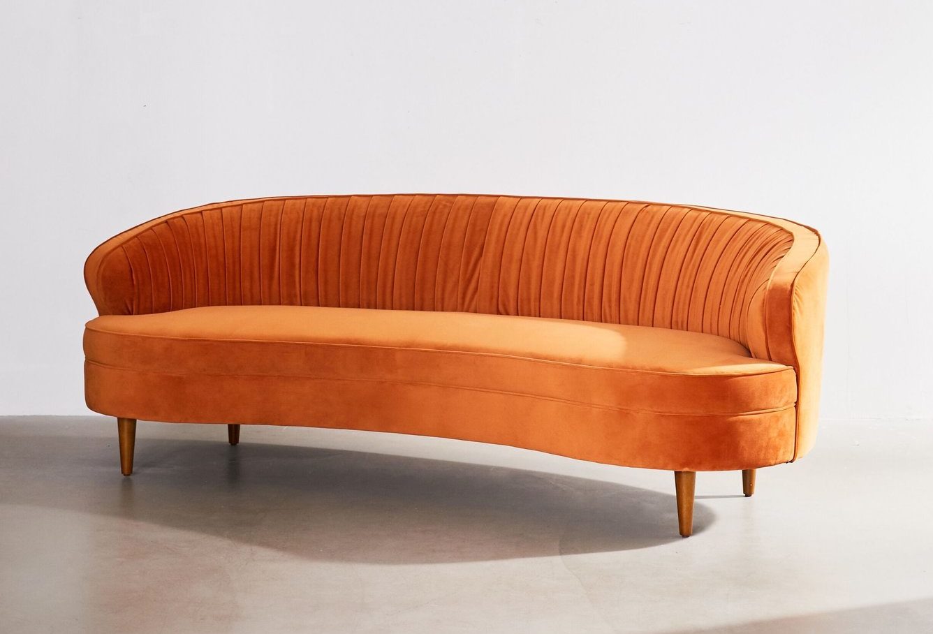 11 MCM Style Sofas To Give Your Living Room A Pop Of Color